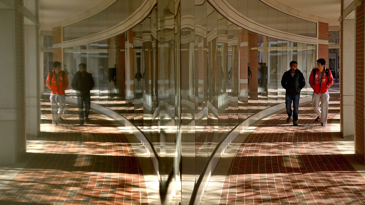 Two students walk on Centennial Campus