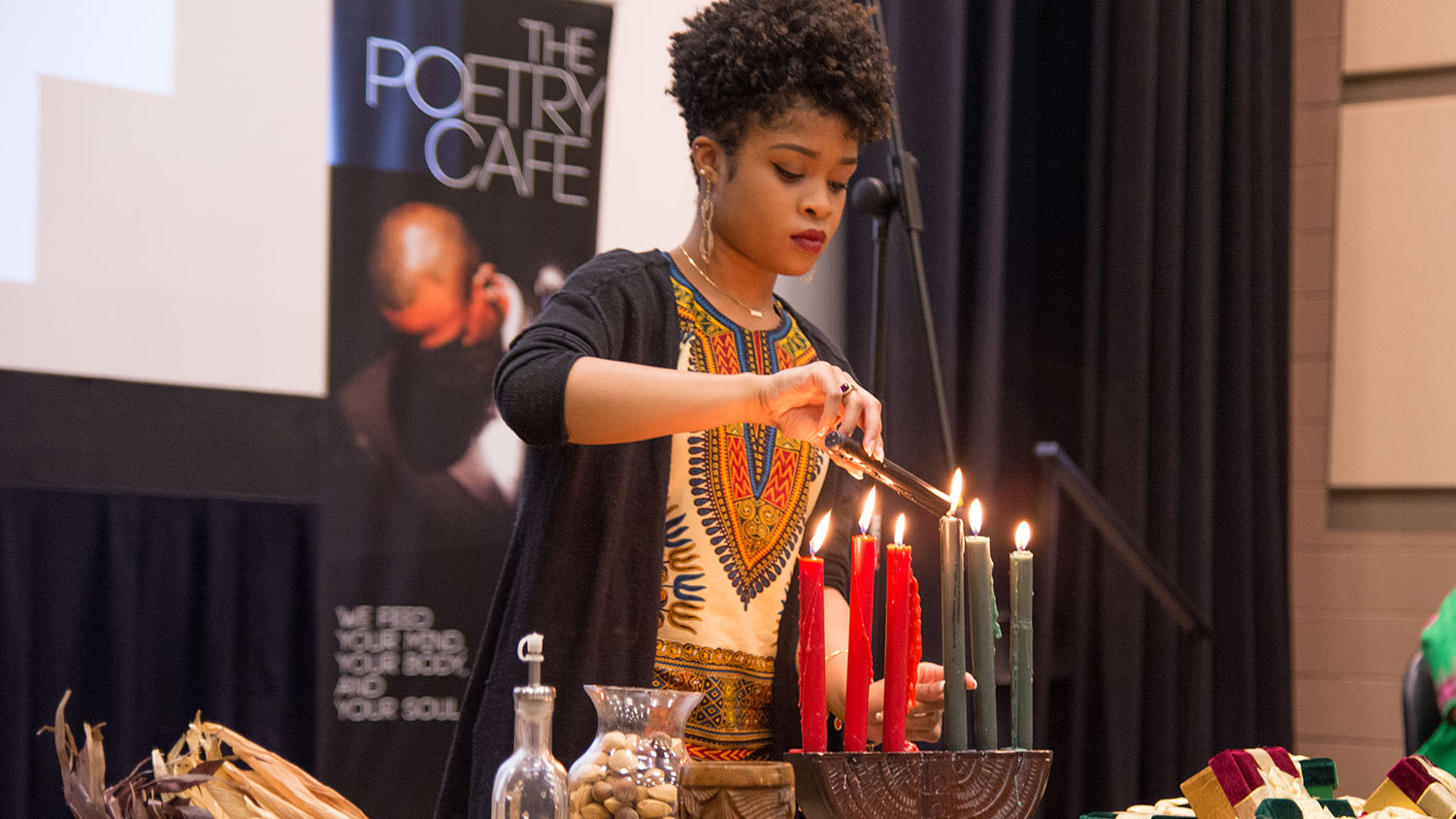 Lighting candles at Kwanzaa 2016