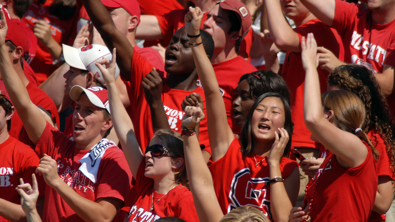 Wolfpack students cheer at athletic event