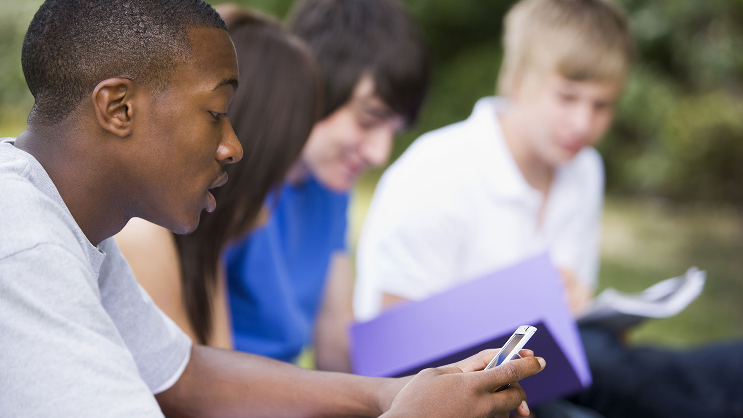 Student looking at phone