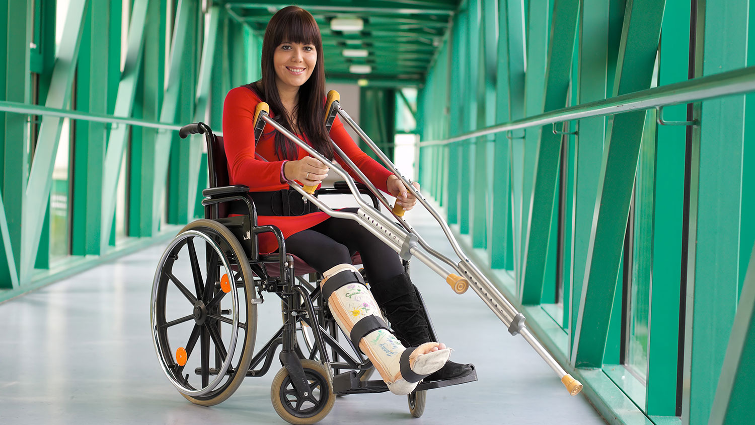 smiling woman in wheelchair