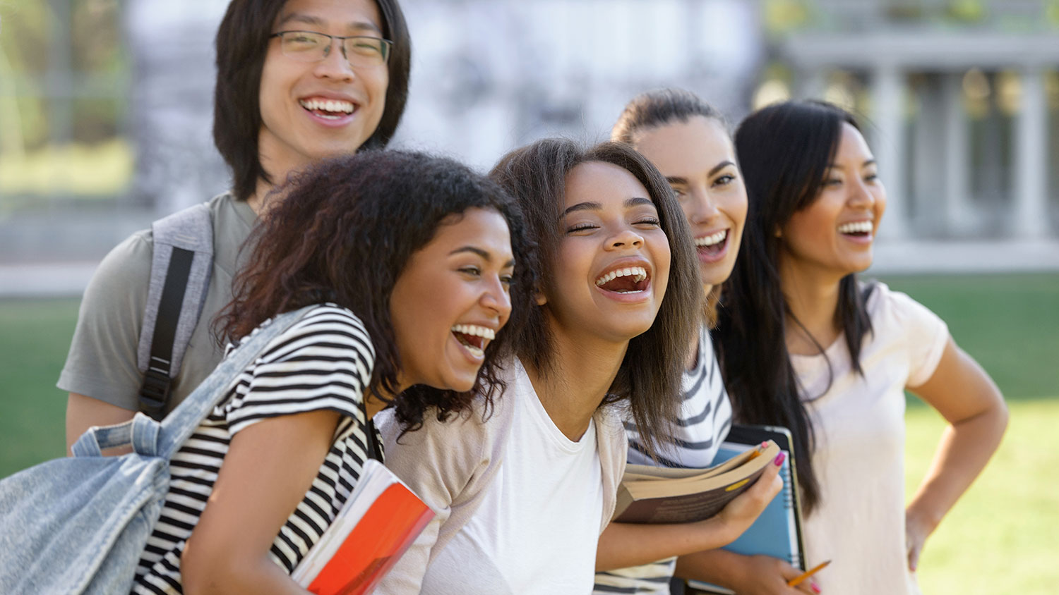 Group of laughing students of color