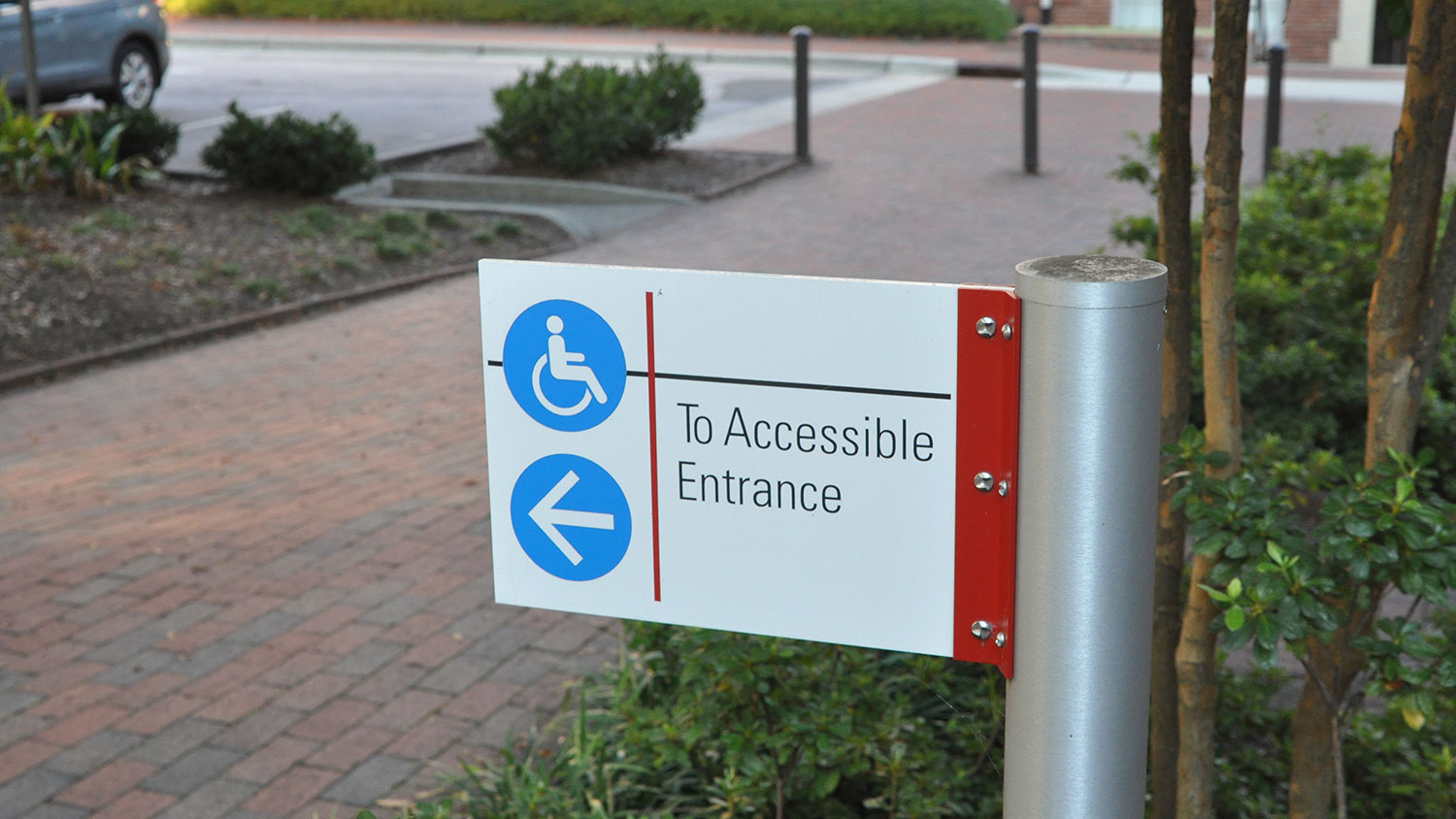 Accessible entrance sign